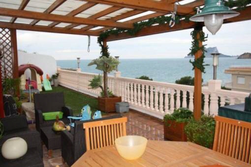 Spacious, partly covered terrace with stunning sea views