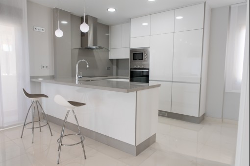 Modern kitchen with white fronts